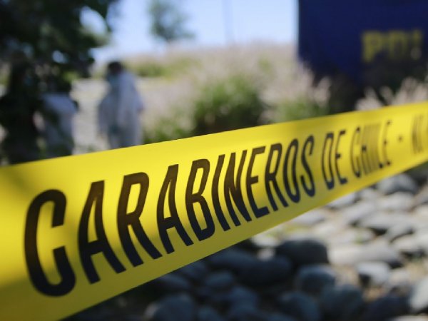 Carabineros y PDI realizando peritajes de un crimen