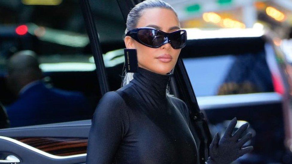 Kim Kardashian attends an event wearing Balenciaga earrings