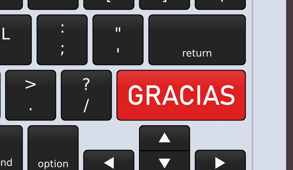 Palabra gracias en un teclado