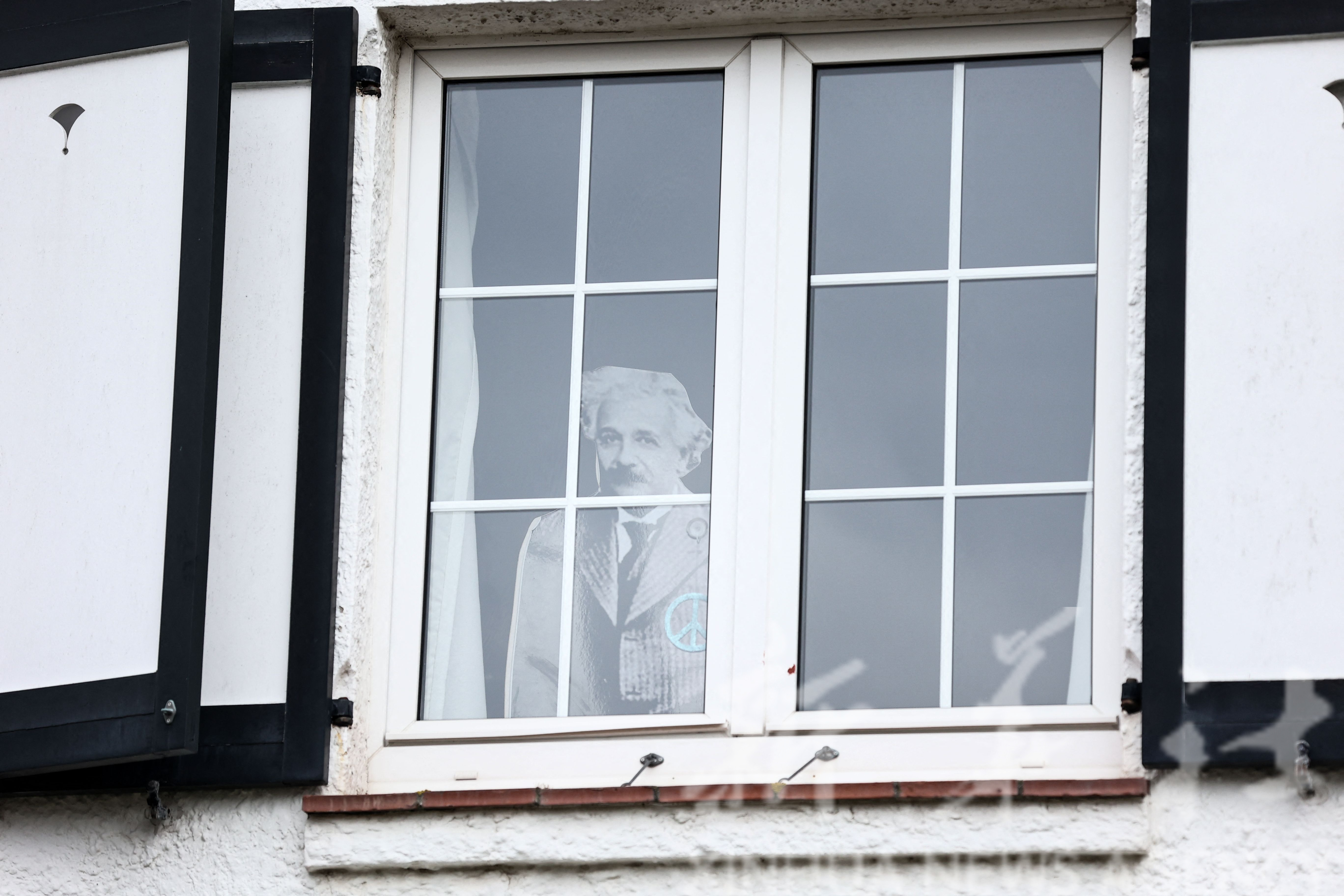 Antimatter. Albert Einstein in a window.