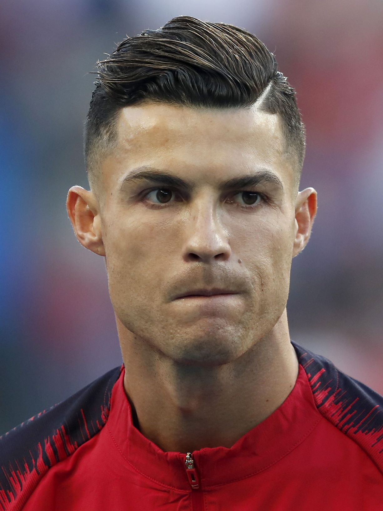 Corte de pelo taper con raya al lado en Cristiano Ronaldo