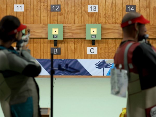 Competitors in the Air Mixed Team Rifle during the Santiago 2023 Pan American Games