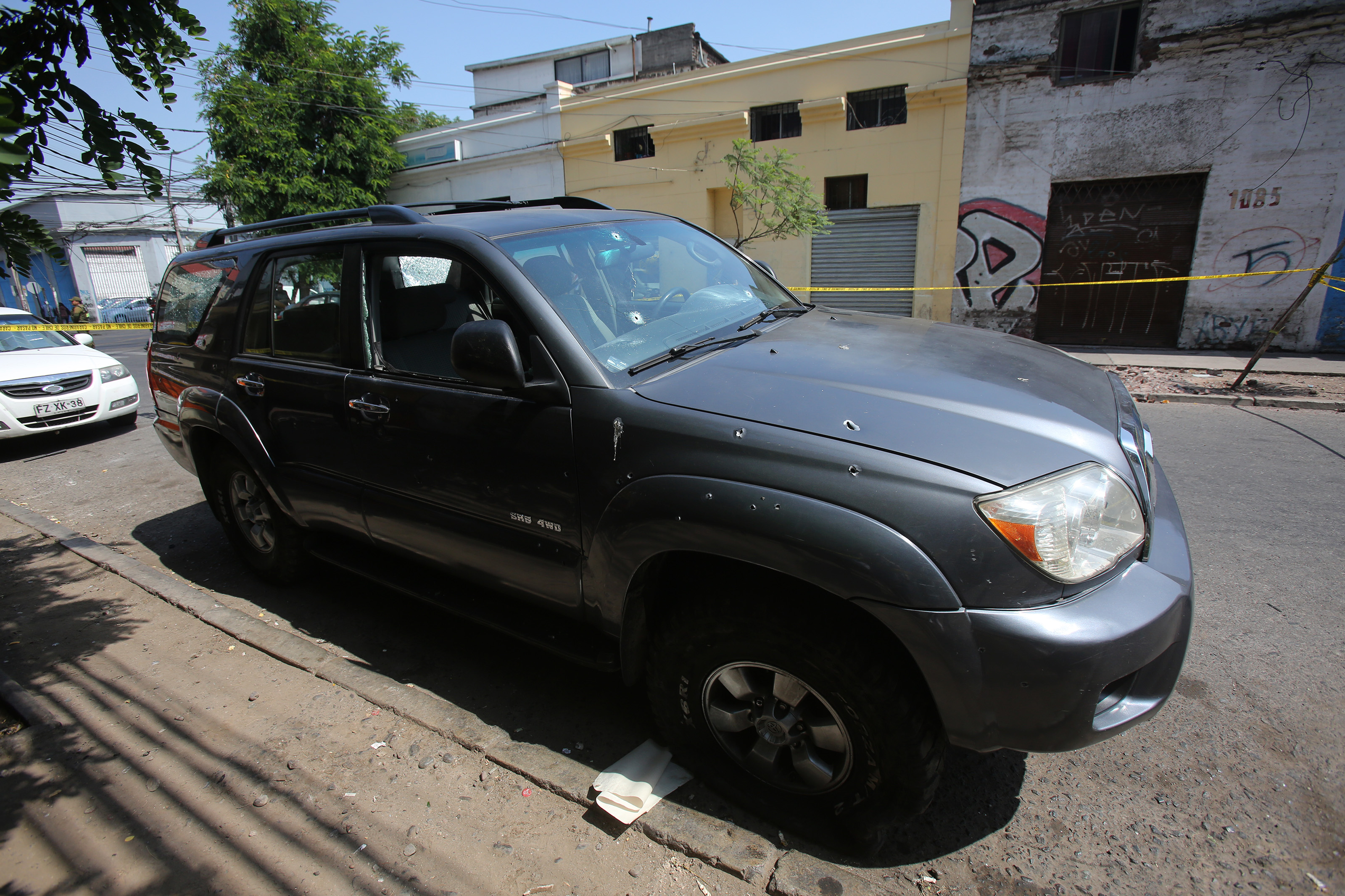 Auto baleado en Santiago.