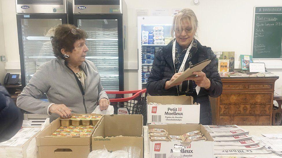 Vecinos en la tienda