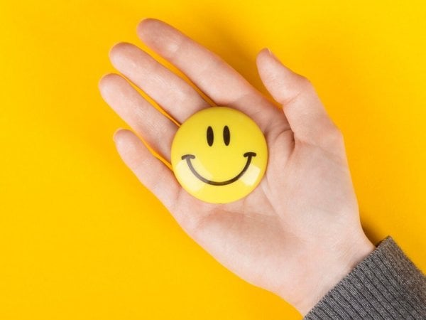 Cara feliz. Día de la Felicidad.