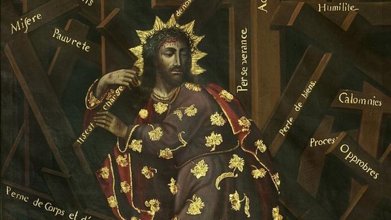 Representación de Jesucristo con la cruz al hombro