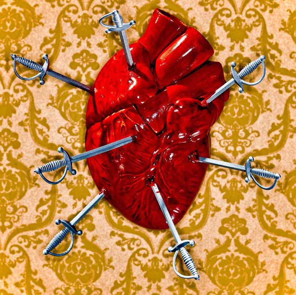Corazón con espadas