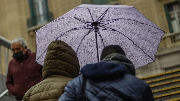 Lluvia, Personas con paraguas