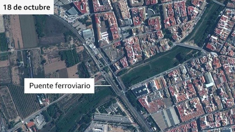 El cauce seco y lleno de vegeración del Turia antes de la riada.
