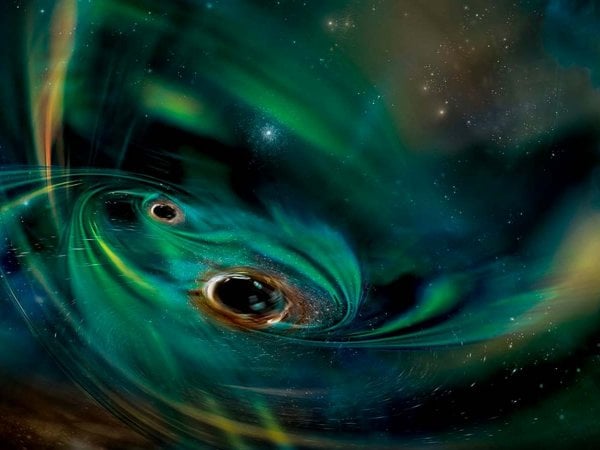 Agujeros negros gemelos descubiertos desde Chile interactuando con una nube de gas en la galaxia 2MASX J21240027+3409114.