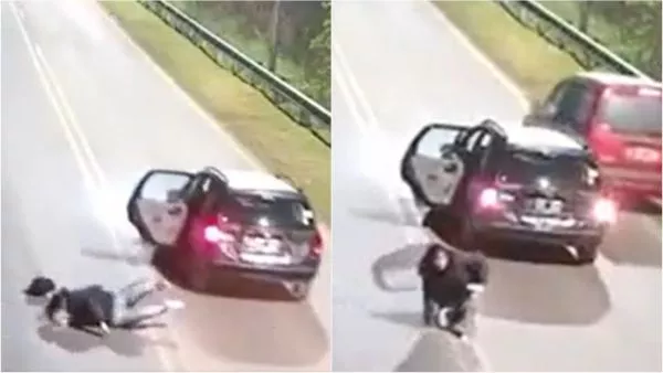 El momento en que la mujer se lanzó de auto en movimiento