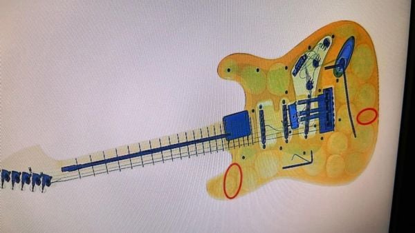 Guitarra con drogas en escáner