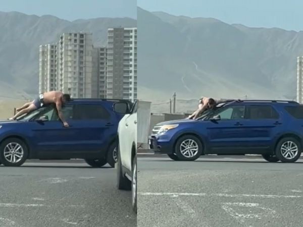 Captura de pantalla que muestra a un hombre semidesnudo sobre el parabrisas de un vehículo azul