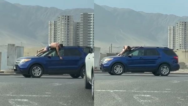 Captura de pantalla que muestra a un hombre semidesnudo sobre el parabrisas de un vehículo azul
