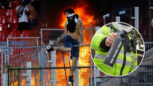 Incidentes en el Estadio Nacional y un policía utilizando el spray de ADN