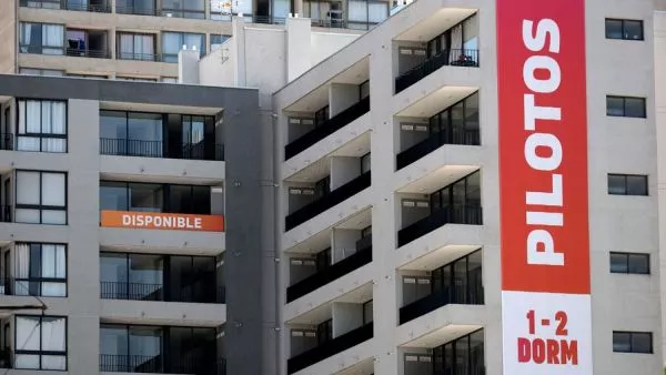 Edificio con departamentos piloto. Black Inmobiliario