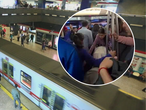 Mujer con coche en el metro