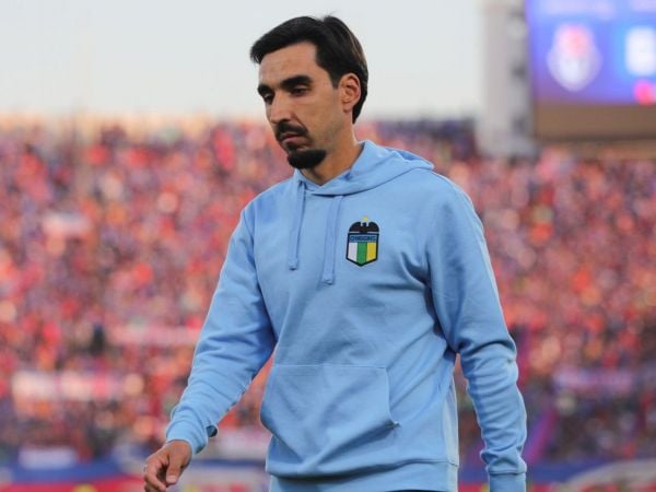 Francisco 'Paqui' Meneghini dirigiendo un partido de O'Higgins