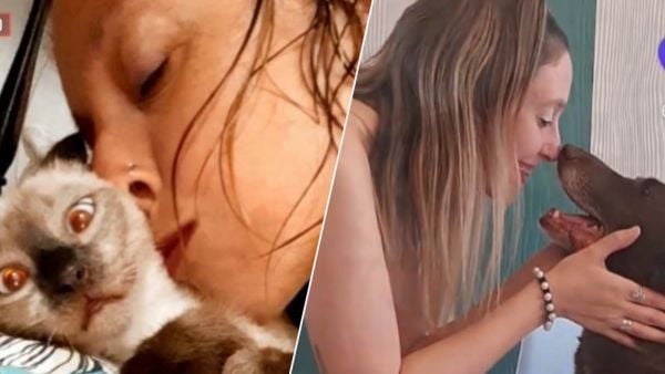 Mujer con sus mascotas en Rosario, Argentina