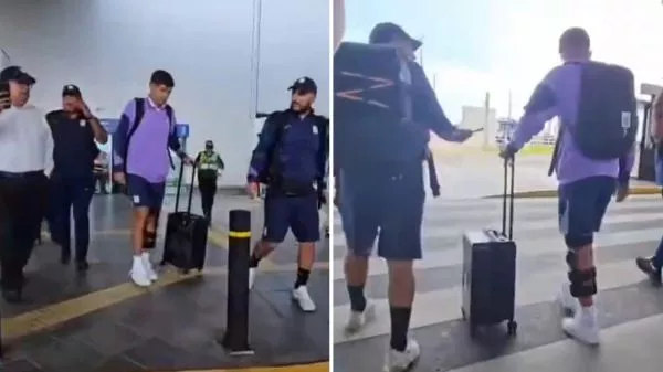 Esteban Pavez cojeando en su retorno a Lima tras lesionarse en su debut con Alianza Lima