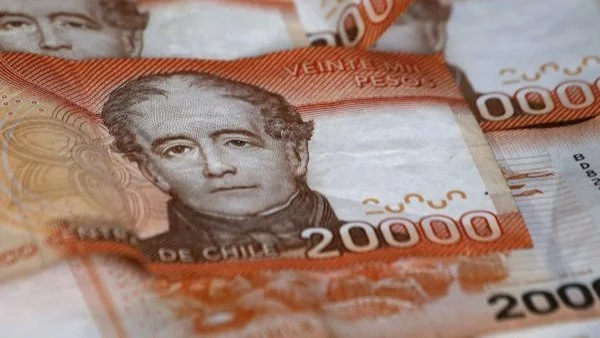 Billetes de 20 mil pesos. Foto referencial de los pagos del Bono al Trabajo de la Mujer (BTM)